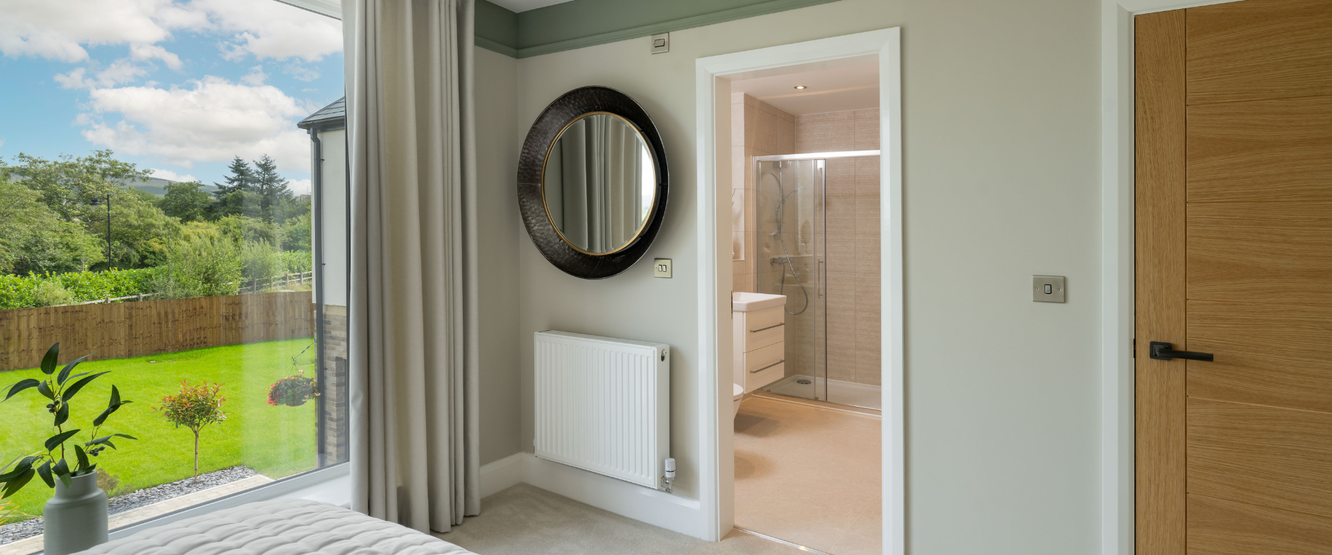 Bedroom with green views and en suite