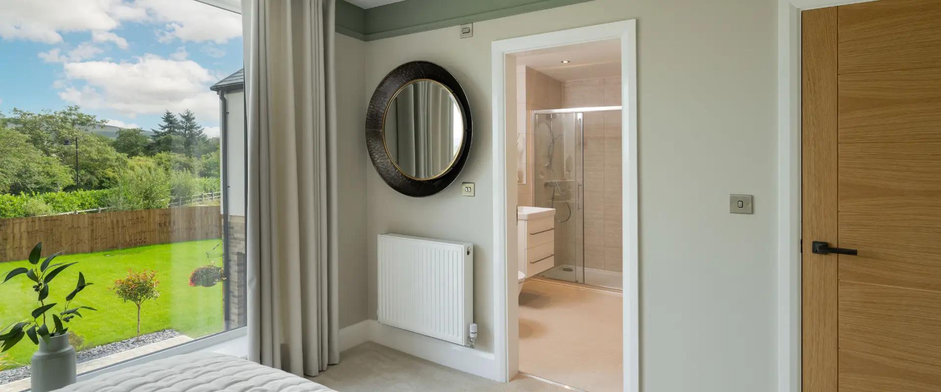 Bedroom with green views and en suite